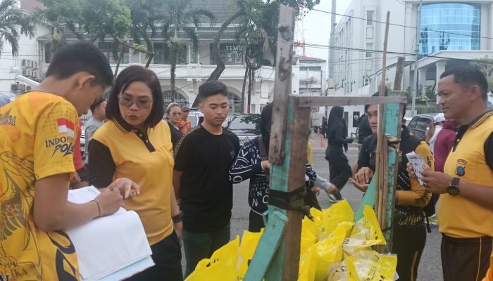 Polda Sumut Bagi-Bagi 10 Ton Beras di Lapangan Merdeka, Warga Antusias Borong SPHP Murah
