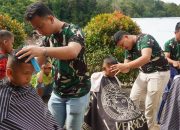 Kodim 0210/Tapanuli Utara Gelar Cukur Rambut Gratis untuk Anak Pengungsi Pascabencana