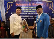 Wali Kota Tanjungbalai Hadiri Buka Puasa Bersama KNPI, Serahkan Santunan dan Sembako untuk Anak Yatim