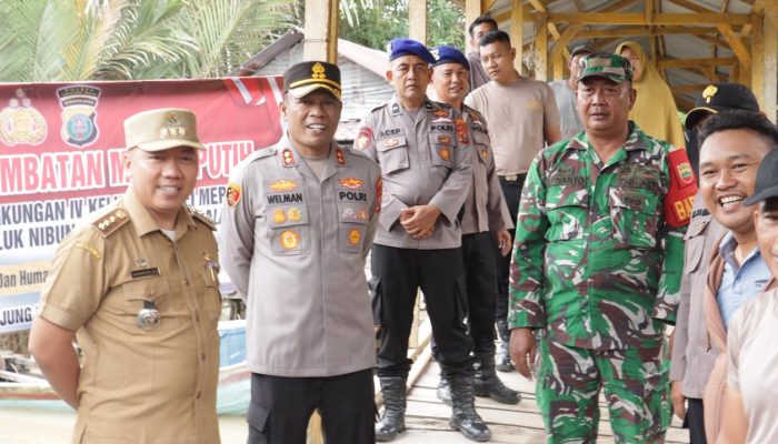 Sentuhan Humanis Polri, Kapolres Tanjungbalai Awali Pembangunan Jembatan Merah Putih